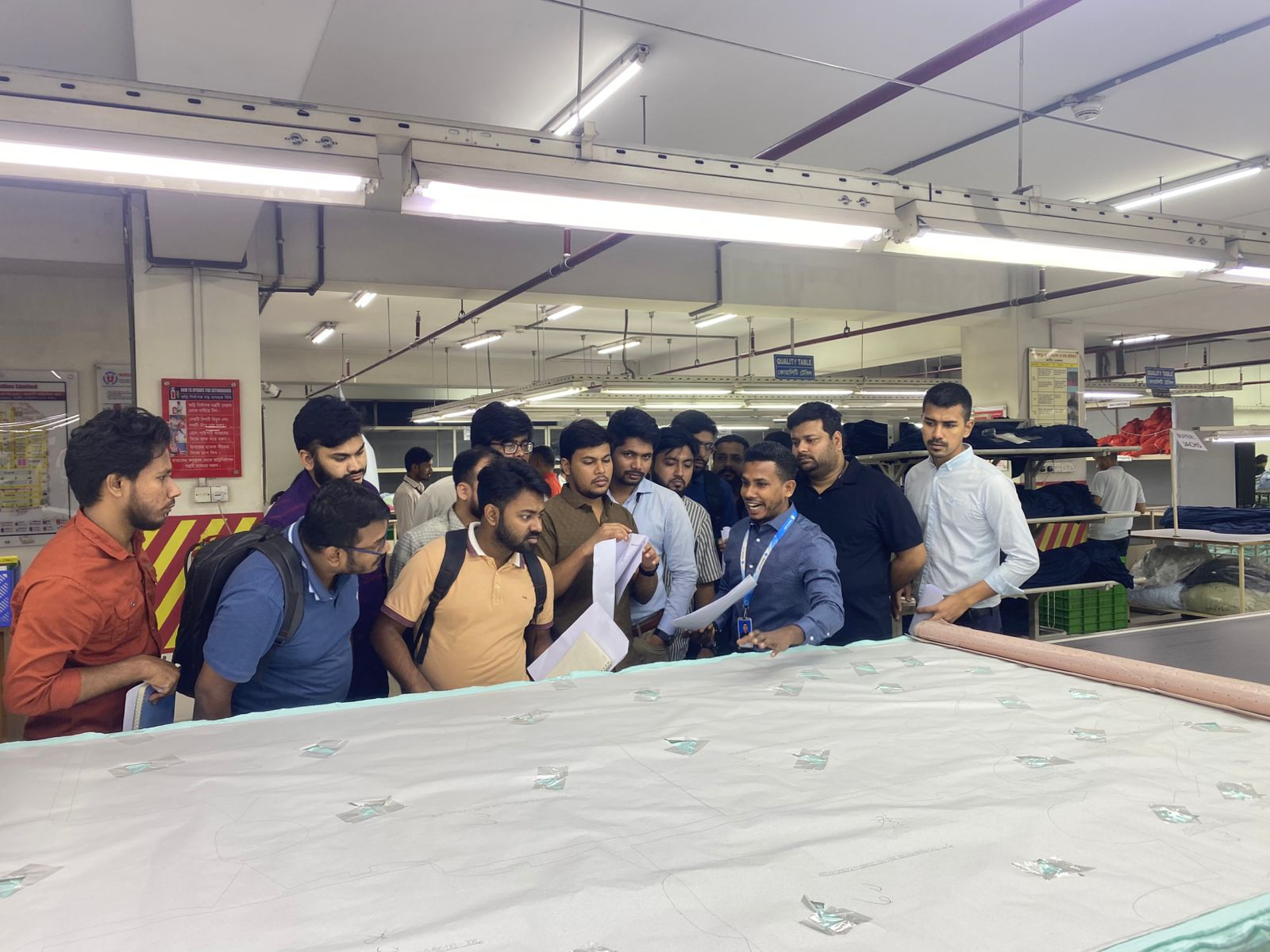 Team on the bus during a factory visit